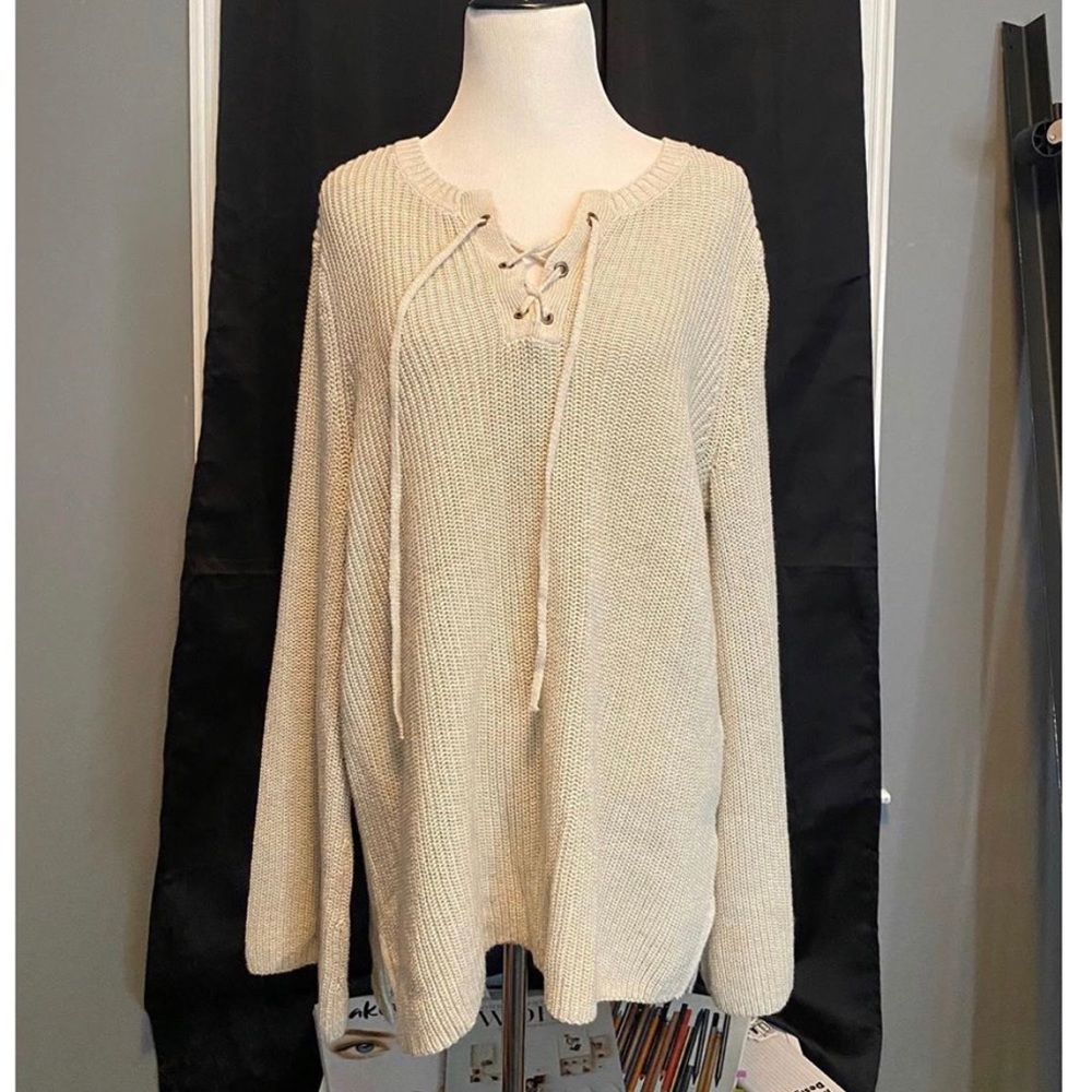 Sweater with cross tie detailing